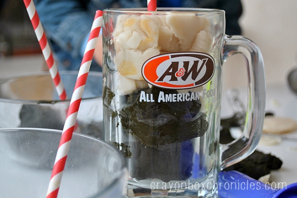 A&W mug with root beer and vanilla play dough