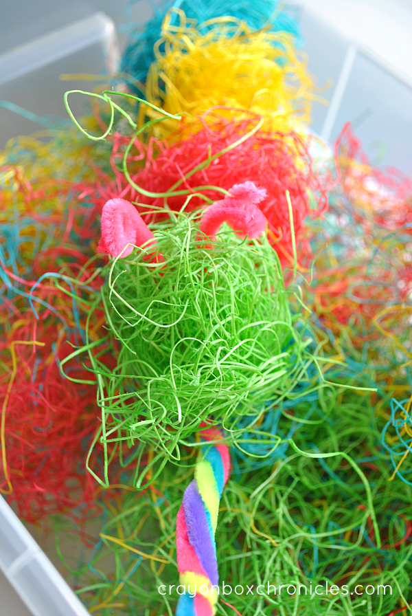 colored hay caterpillar for sensory play